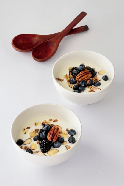 High angle bowls with yogurt and fruits