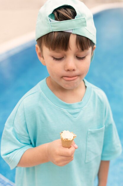 High angle boy eating ice cream