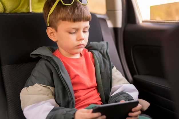 High angle boy with tablet