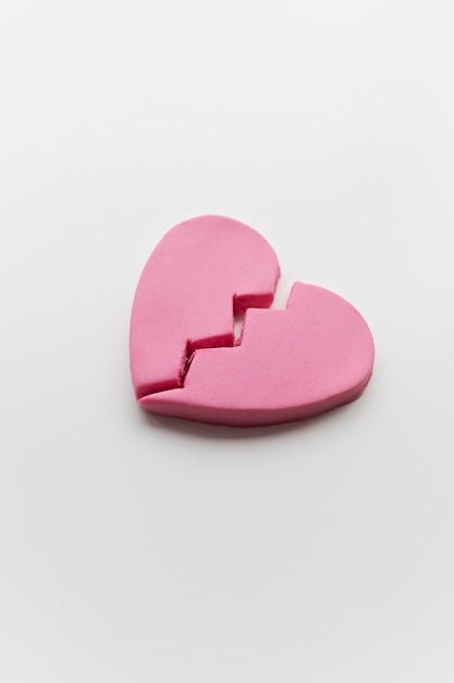 Free Photo high angle of broken heart background