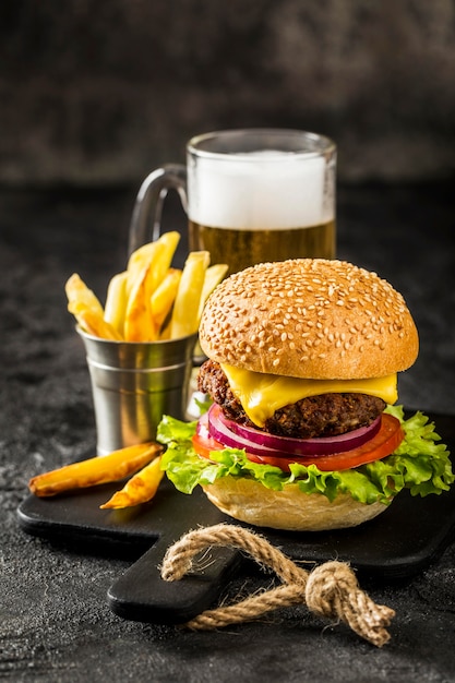 High angle burger with fries and beer