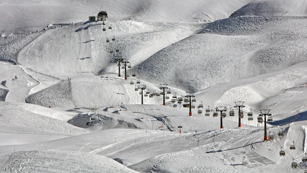 High-angle  of cable cars near snow ground