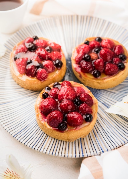 Free Photo high angle cakes with fruits