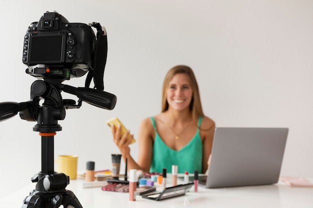 High angle camera filming woman