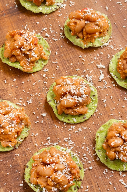 High angle chilli beans on crackers