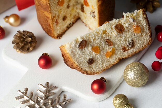 High angle christmas ornaments and panettone