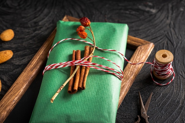 High angle cinnamon sticks on wrapping paper