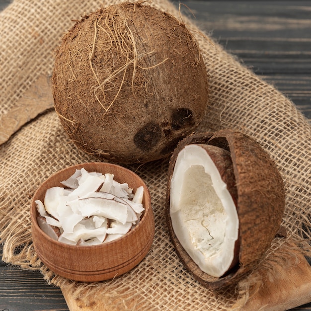 Free photo high angle of coconut on burlap