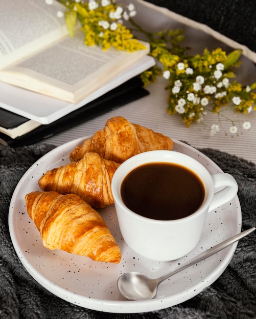 High angle coffee and croissants for breakfast