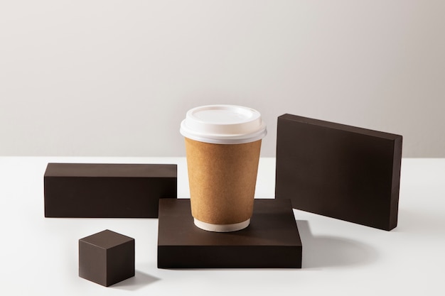 High angle coffee cup with wooden boards