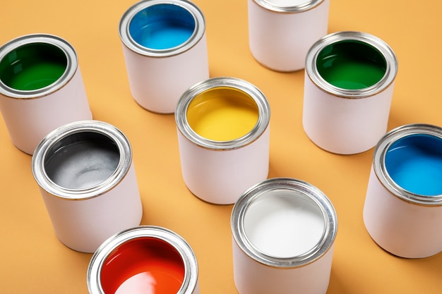 Free photo high angle colorful paint cans arrangement