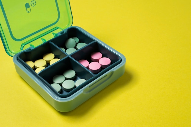 High angle colorful pills in box arrangement