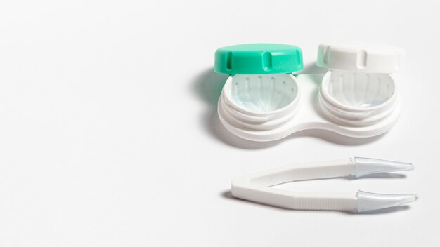 High angle of contact lenses case with copy space and tweezers