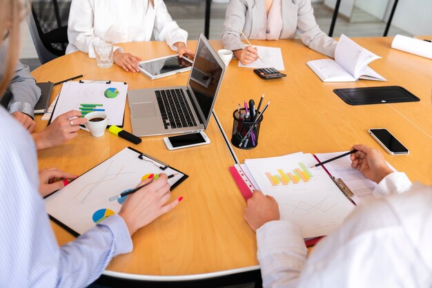 High angle corporate desk with electronic devices