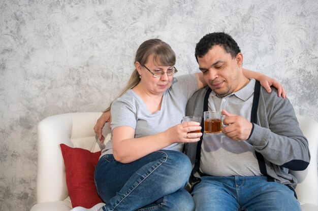 High angle couple drinking tea