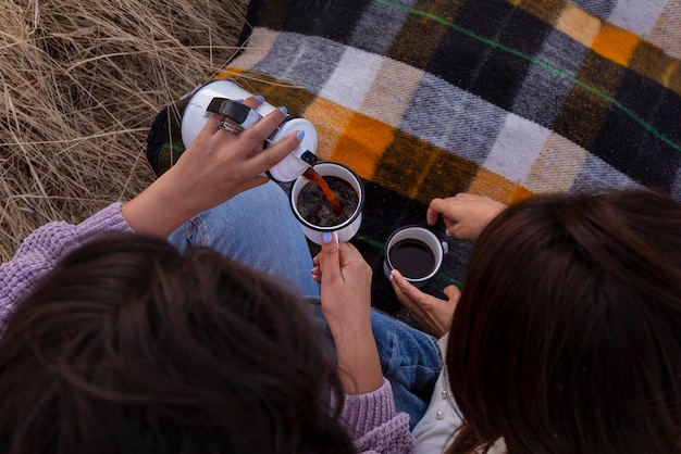 Free photo high angle couple spending time outdoors