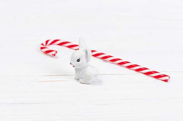 High angle decoration with white rabbit and candy