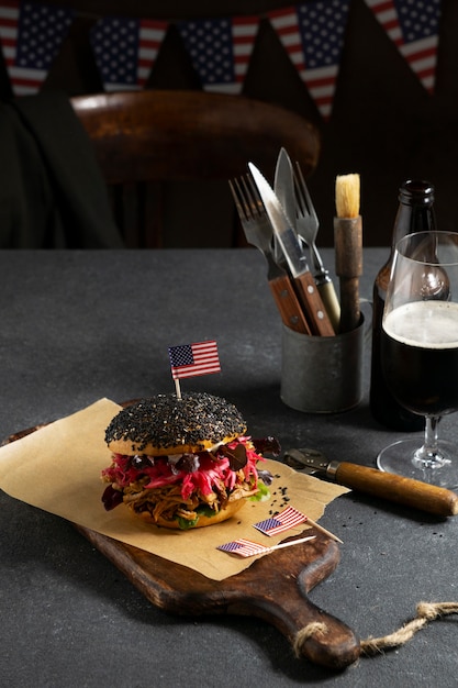 High angle delicious burgers on wooden board