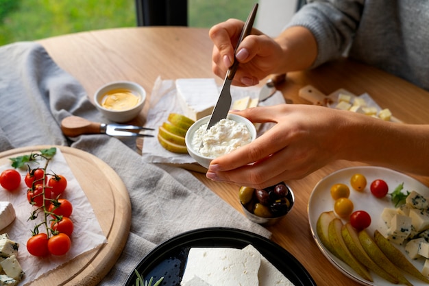 Free photo high angle delicious cheese dish on table