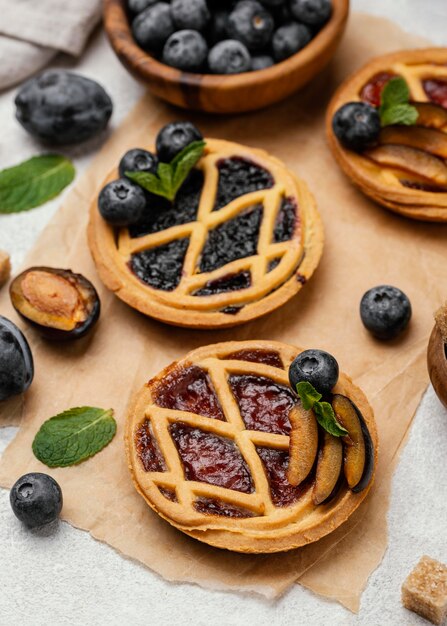 High angle of delicious pies with fruits