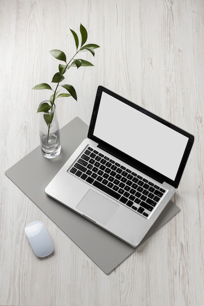 High angle desk arrangement with laptop