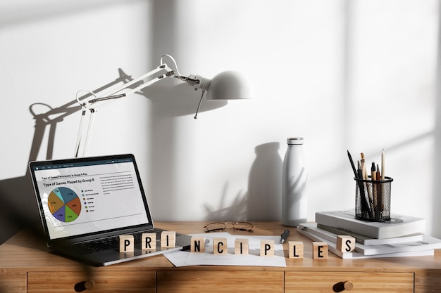 High angle desk arrangement with laptop