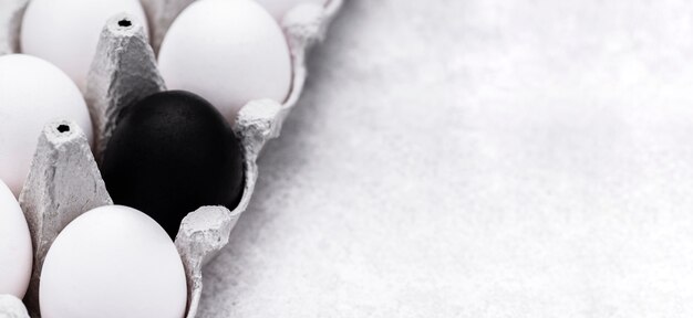 High angle of different colored eggs for black lives matter movement with copy space