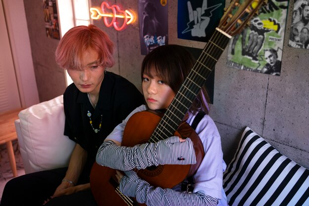 High angle emo friends with guitar