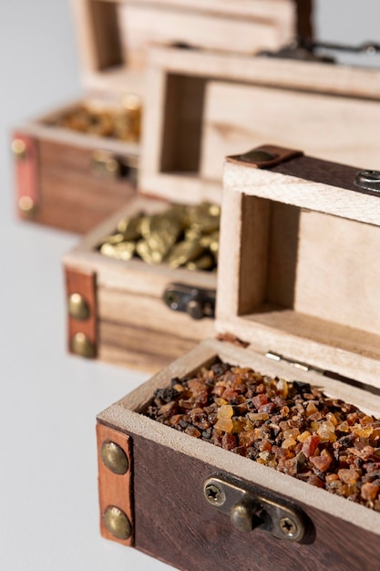 Free photo high angle of epiphany day treasure chests with raisins and stones