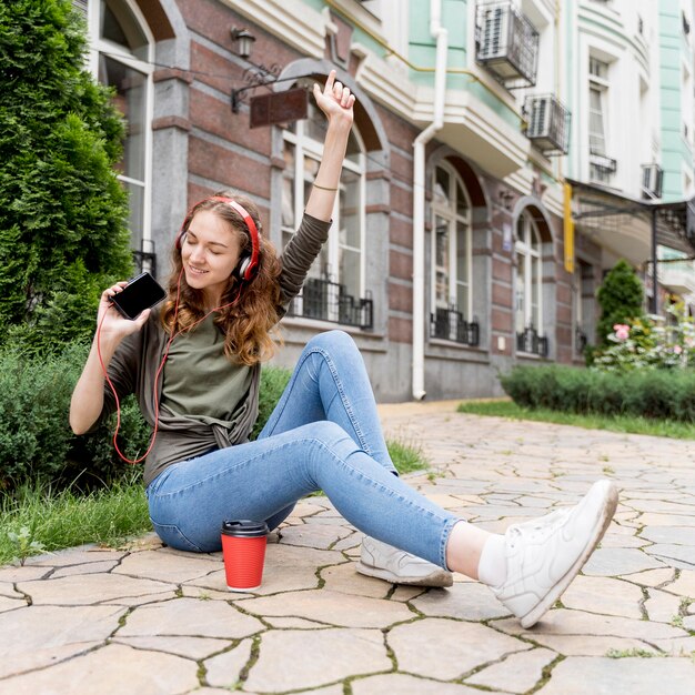 High angle female with headphones