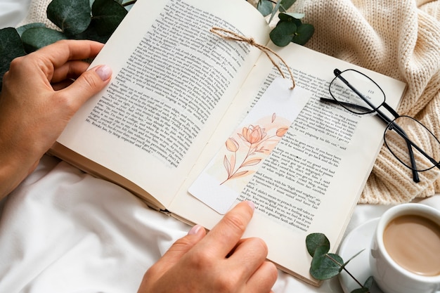 High angle floral bookmark on book