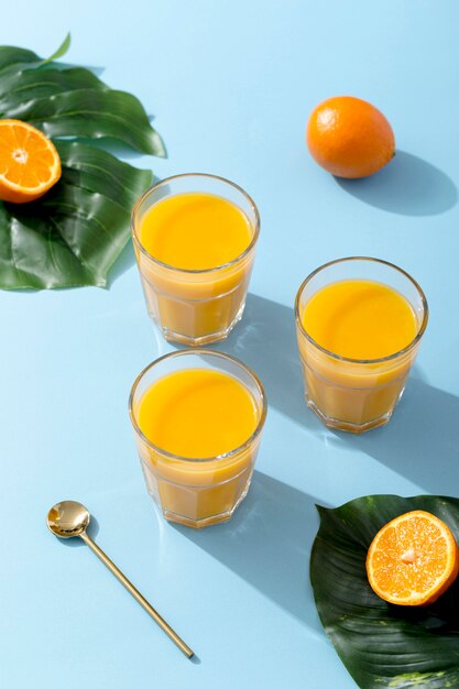 High angle fresh orange smoothies