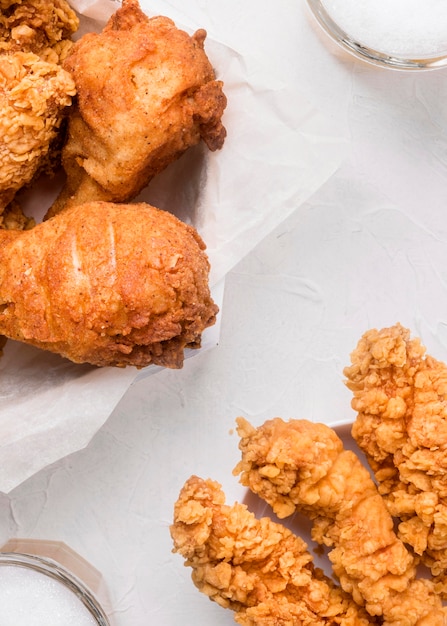 Free photo high angle fried chicken pieces