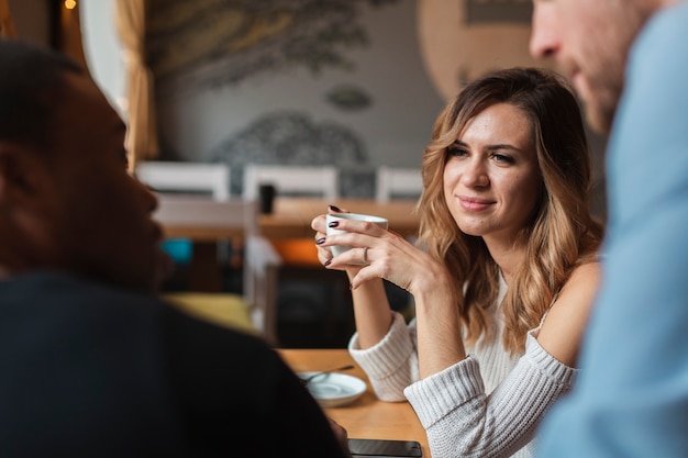 High angle friends drinking coffee