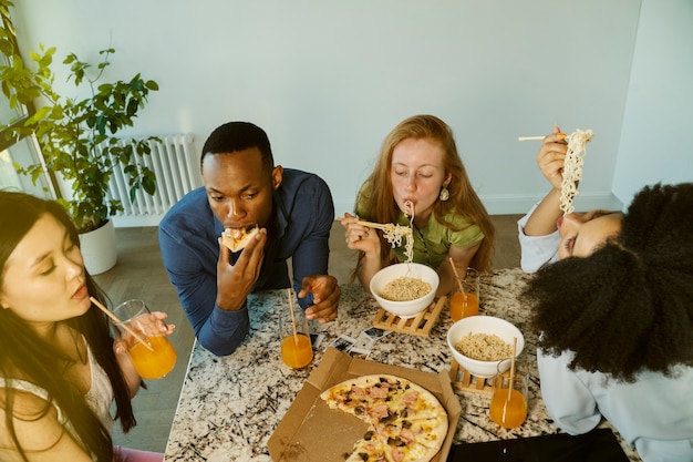 High angle friends eating together