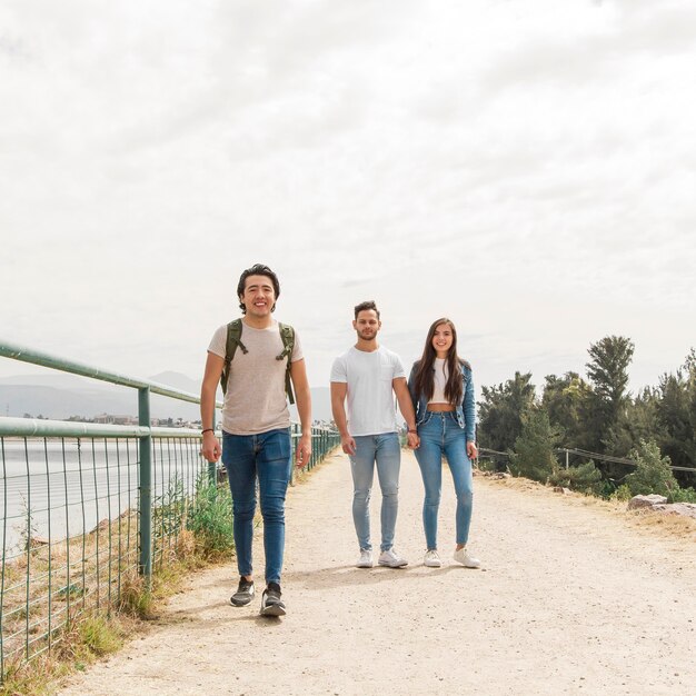 High angle friends walking in nature