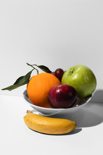 Free photo high angle of fruit bowl with copy space