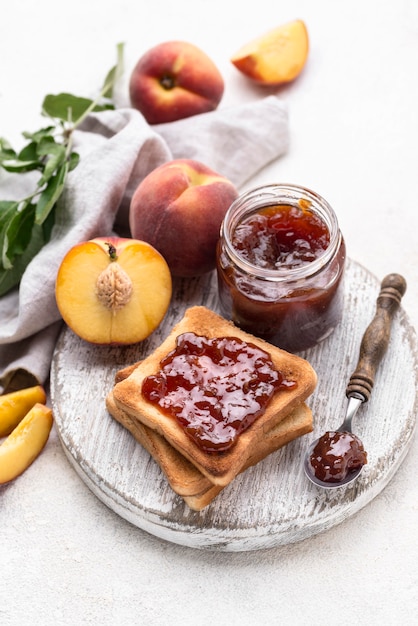 Free photo high angle fruit jam on bread