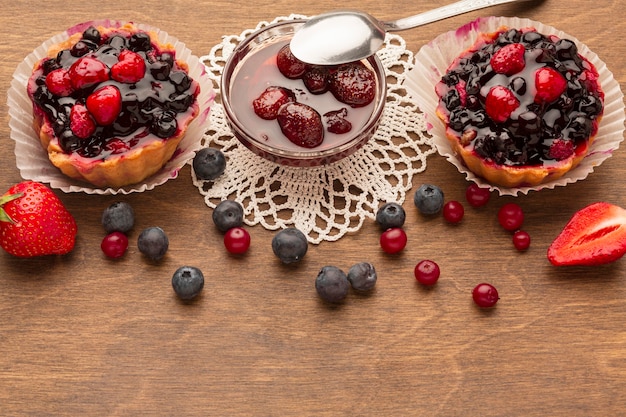 Free photo high angle fruit tarts arrangement