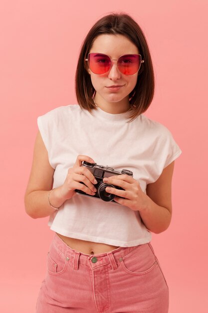 High angle girl holding camera