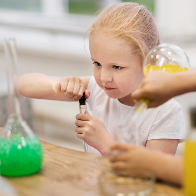 High angle girl at science class