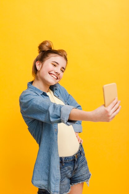 High angle girl taking selfie