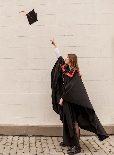 Free photo high angle graduated girl