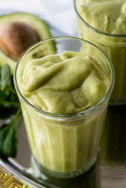 High angle green smoothie with avocado