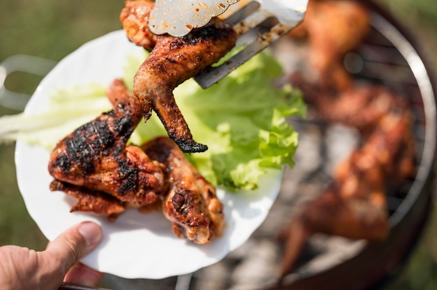 Free Photo high angle of grilled meat with salad on plate