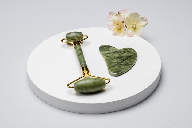 High angle gua sha and flower arrangement