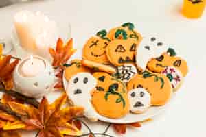 Free photo high angle of halloween cookies concept