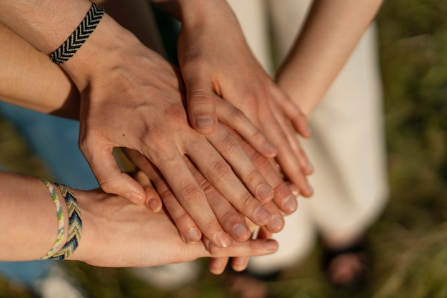 Free photo high angle hand gestures representing friendship