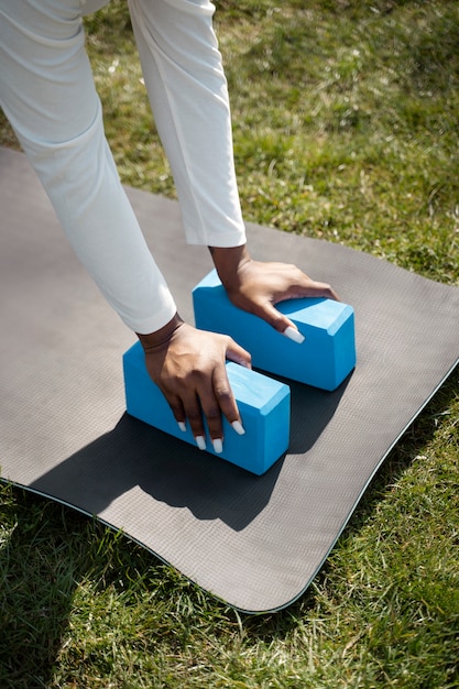 High angle hands using yoga blocks