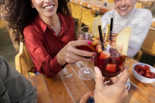 High angle happy women with sangria